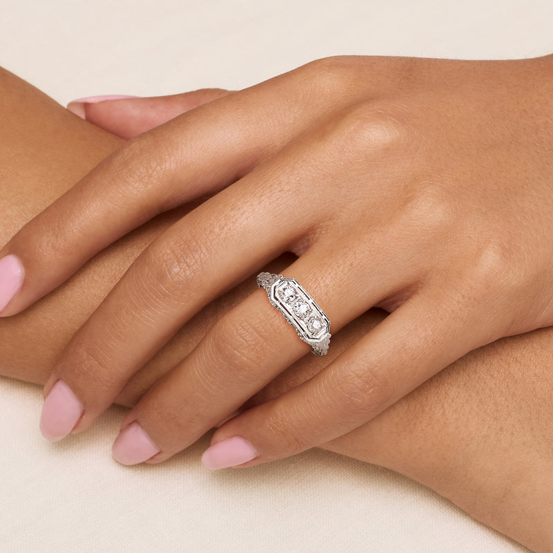 Diamond filigree ring with three-stone rectangular top, 18kt white gold band