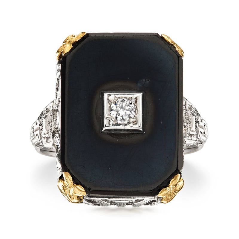 Two-tone gold ring with octagonal black onyx and square diamond center setting