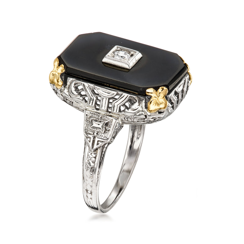 Ornate two-tone gold ring with octagonal black onyx top and small square diamond