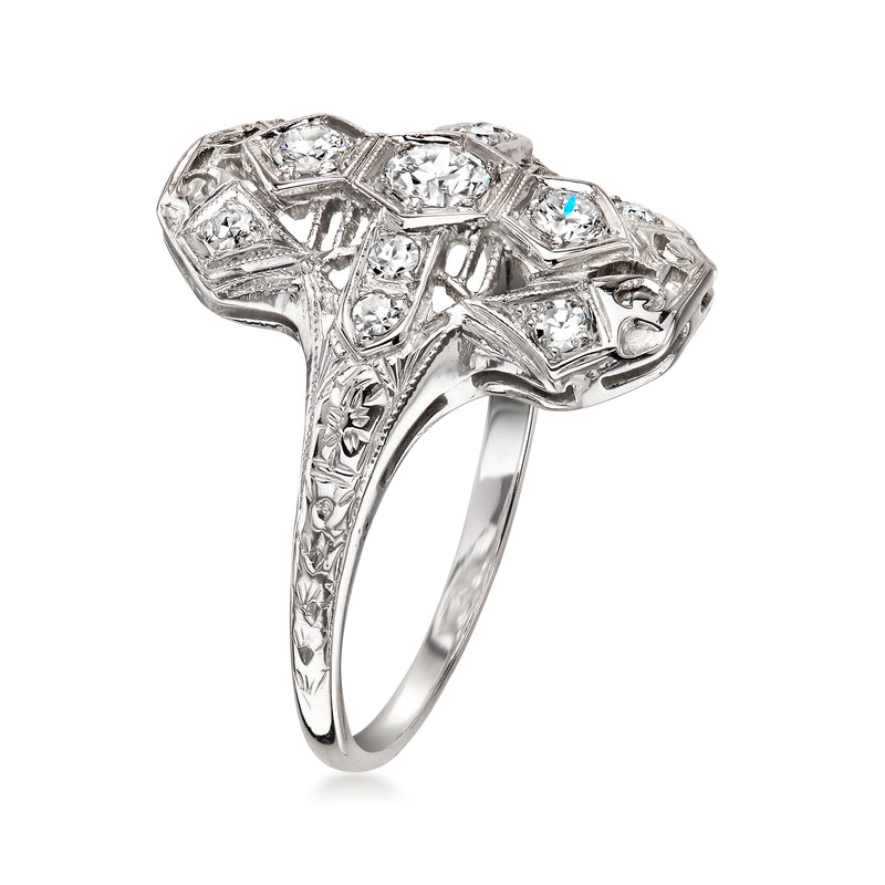 White gold diamond dinner ring side view with prong-set round stones in lattice setting