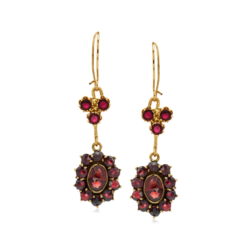 Gold-tone drop earrings with ruby-red stone clusters and earwire hooks