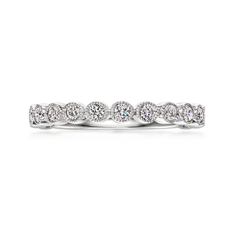 14kt white gold diamond ring with round stones in a continuous row across the band