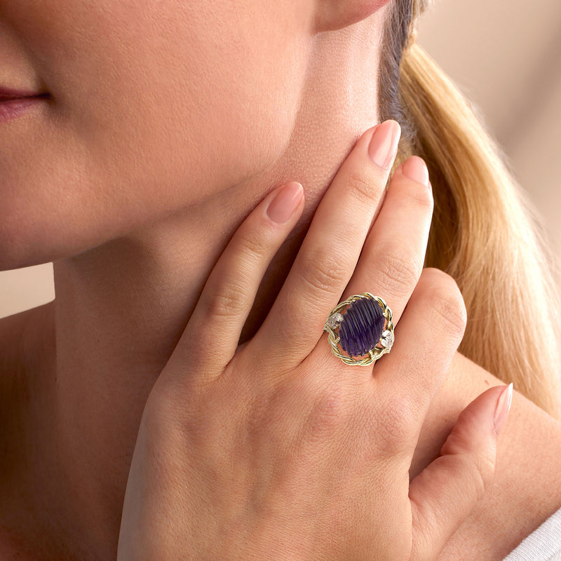 C. 1980 Vintage 11.25 Carat Carved Amethyst Ring with .15 ct. t.w. Diamonds in 14kt Yellow Gold. Size 6.5