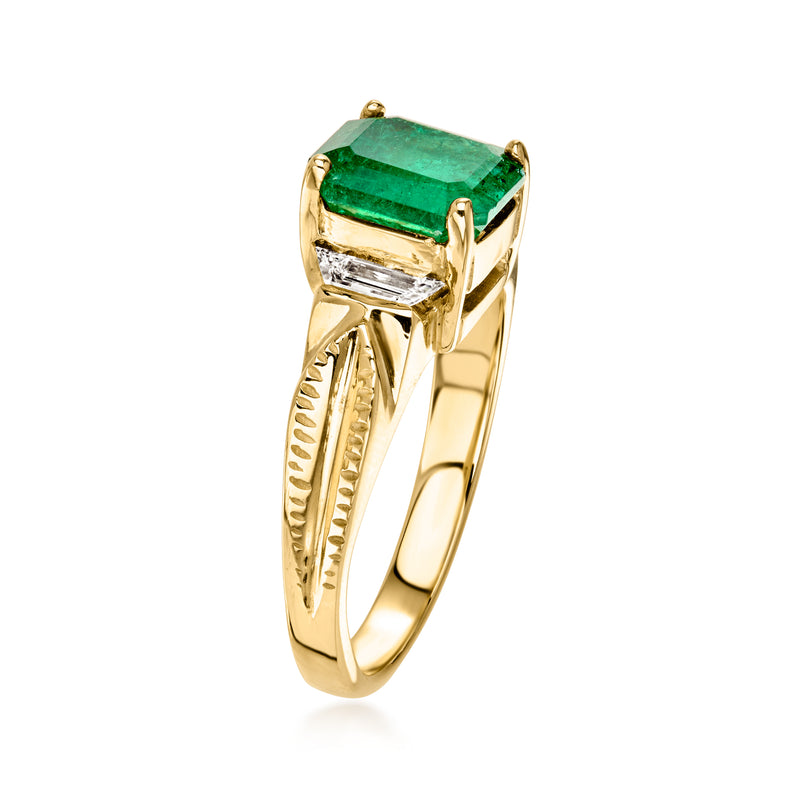 Yellow gold ring with square green emerald stone and baguette diamond panels