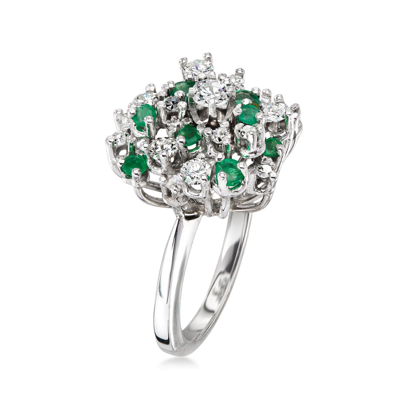 C. 1980 Vintage .80 ct. t.w. Diamond and .65 ct. t.w. Emerald Cluster Ring in 18kt White Gold. Size 5.75