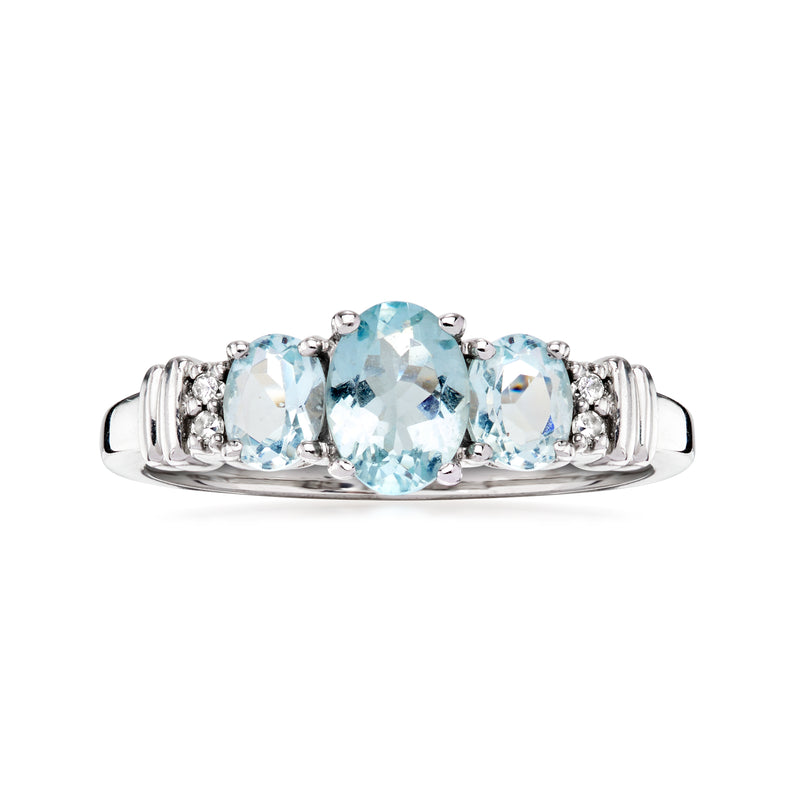 Aquamarine and diamond three-stone ring in 10kt white gold, rounded prongs