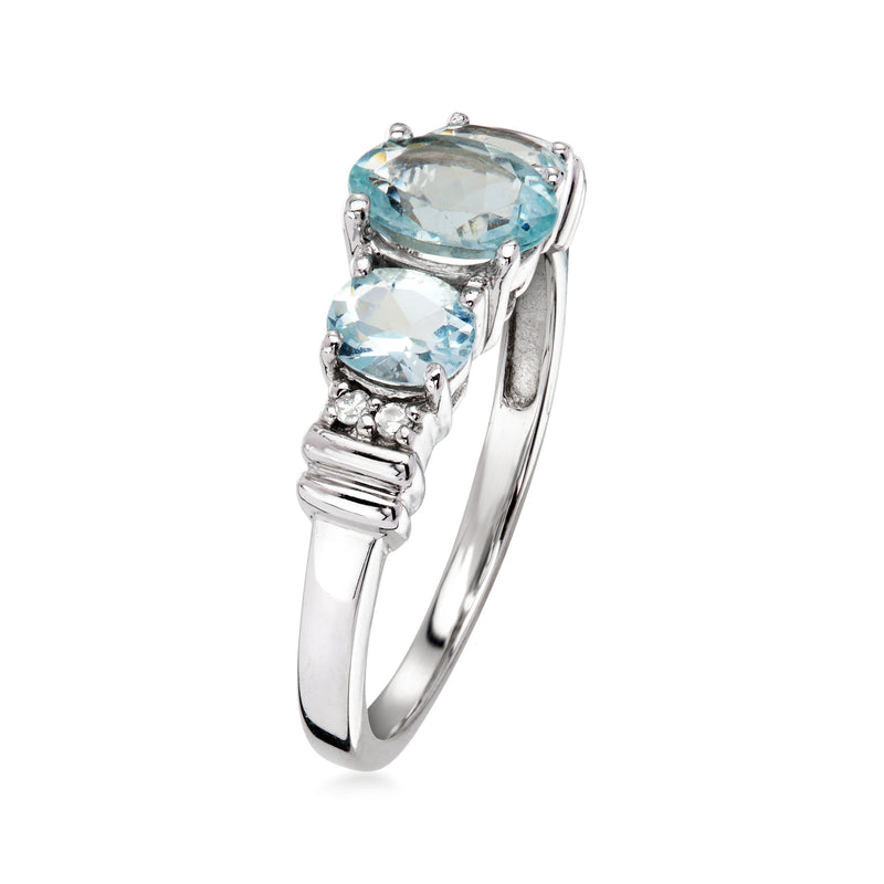 Side view aquamarine three-stone ring with diamond accents in 10kt white gold