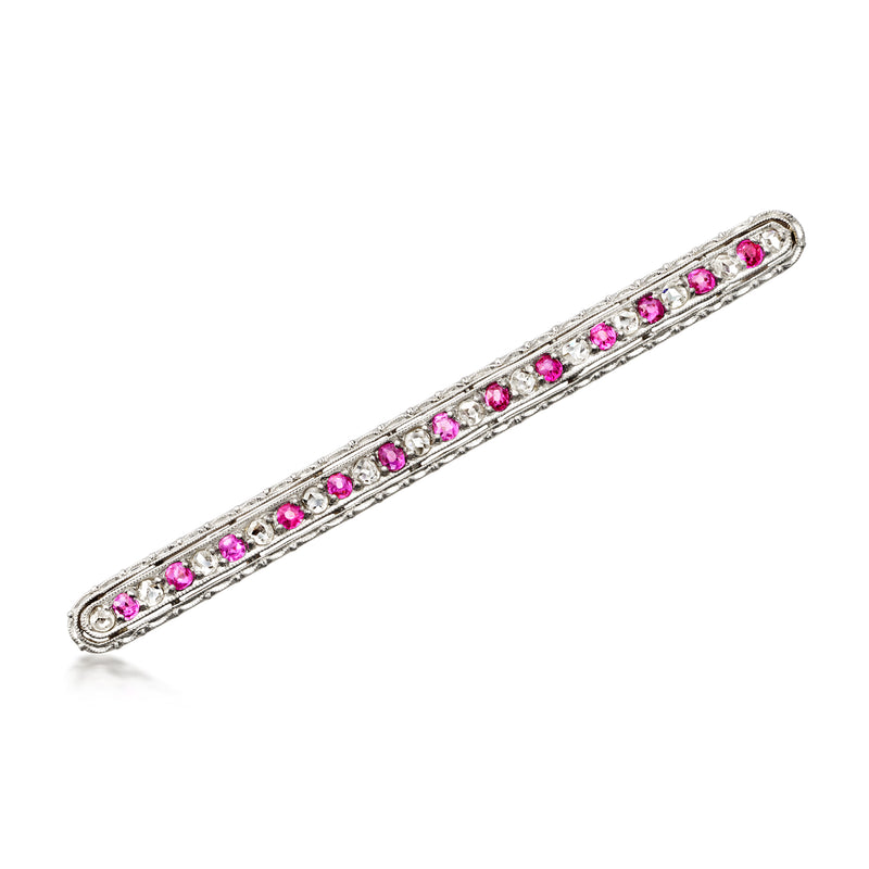 Ruby gemstone bar pin with round pink stones in a row on a metal bar
