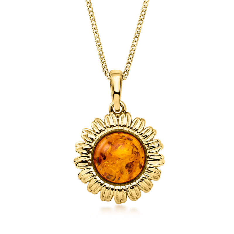 Gold sunflower pendant necklace with amber round center cabochon on short drop