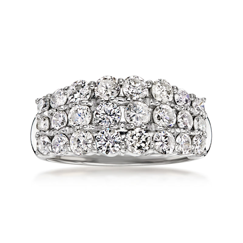Platinum three-row diamond ring with prong-set round stones in a wide band
