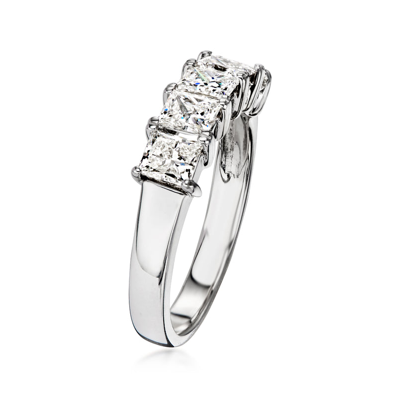 Five-stone diamond ring with rectangular stones set on a polished white gold band