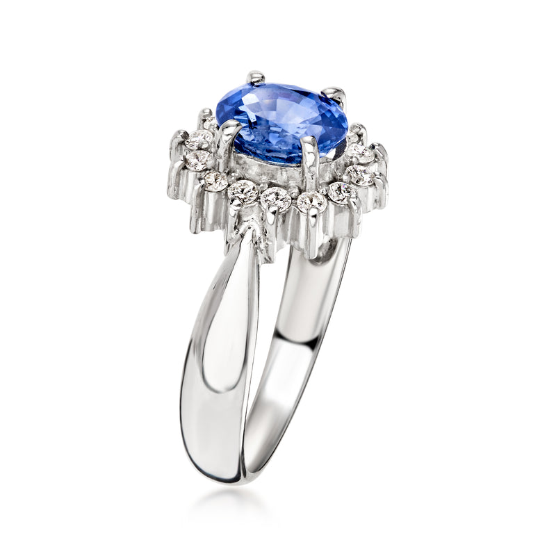 Platinum sapphire ring with diamond halo
