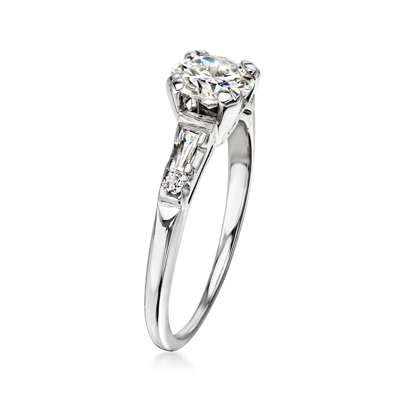 White gold diamond ring with round center stone, baguette and small accent diamonds