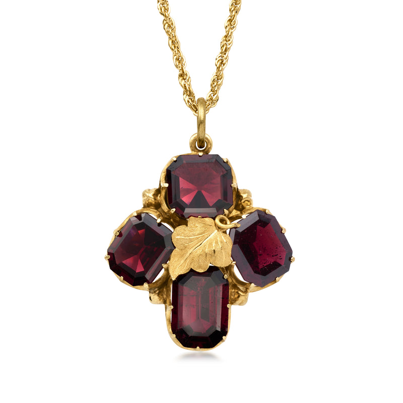 14kt yellow gold garnet leaf pendant necklace with five dark red gemstones