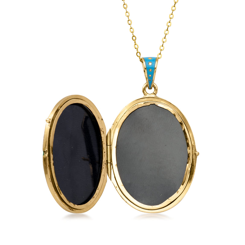 Open oval locket necklace with black interior backing in gold frame