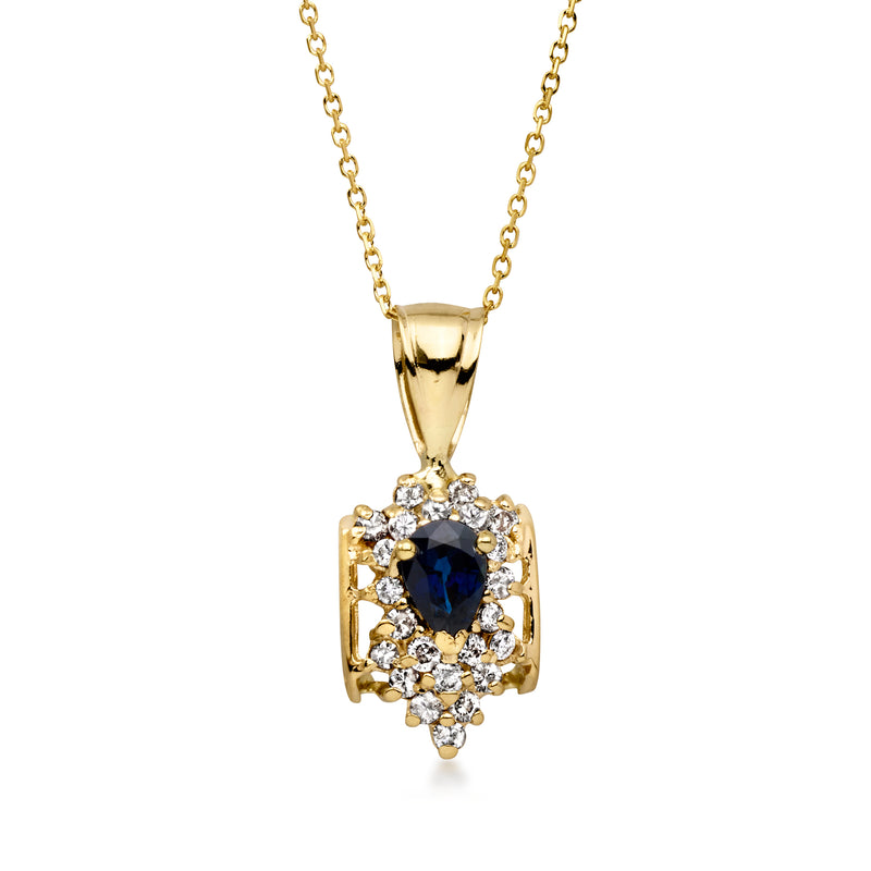 Yellow gold pendant necklace with oval sapphire center and diamond halo