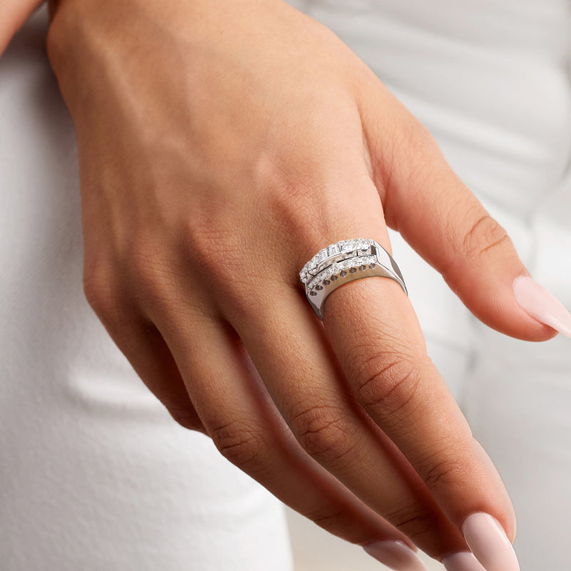 Three-row diamond ring in 14kt white gold on hand, round and baguette stones