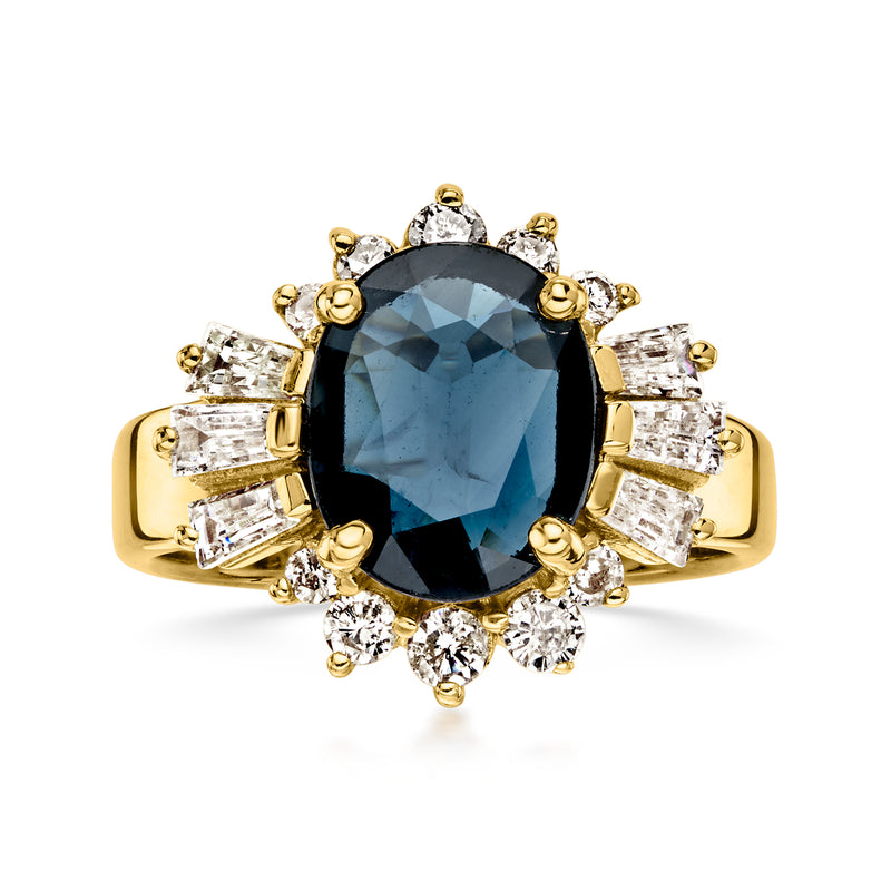 Vintage yellow gold ring with oval blue sapphire center and diamond side stones