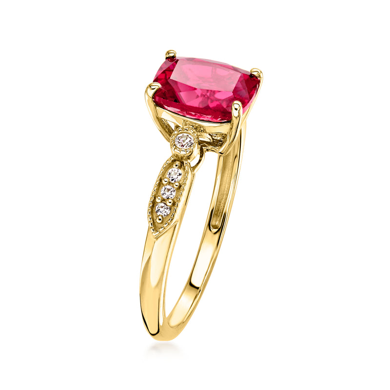 10kt yellow gold ring with pink ruby center stone and white accents on split shoulders