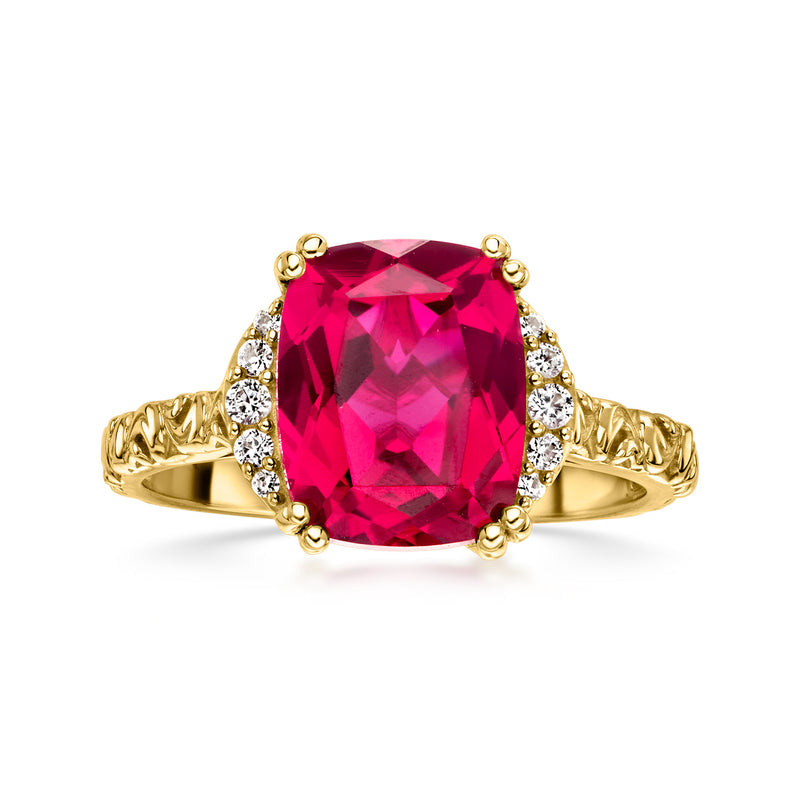 Oval pink-red ruby ring with white sapphire halo, 10kt yellow gold setting