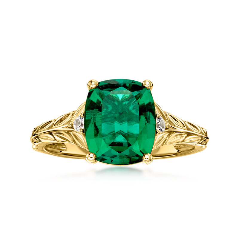 10kt yellow gold ring with large emerald green faceted gemstone and sculpted band