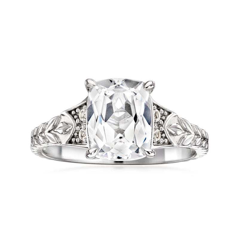 Sterling silver ring with large cushion-cut white sapphire and ornate leaf sides
