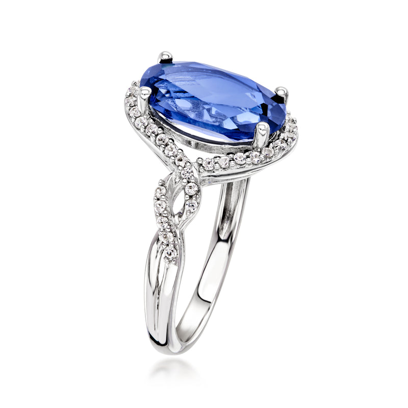 Sterling silver ring with oval blue sapphire and white sapphire accents