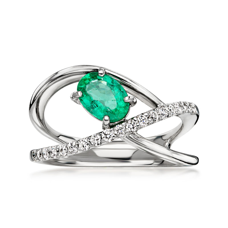 C. 2000 Vintage .64 Carat Emerald Open-Space Ring with .25 ct. t.w. Diamonds in Platinum. Size 6.25