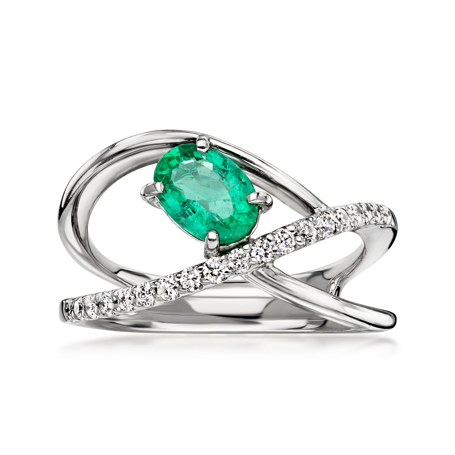 C. 2000 Vintage .64 Carat Emerald Open-Space Ring with .25 ct. t.w. Diamonds in Platinum