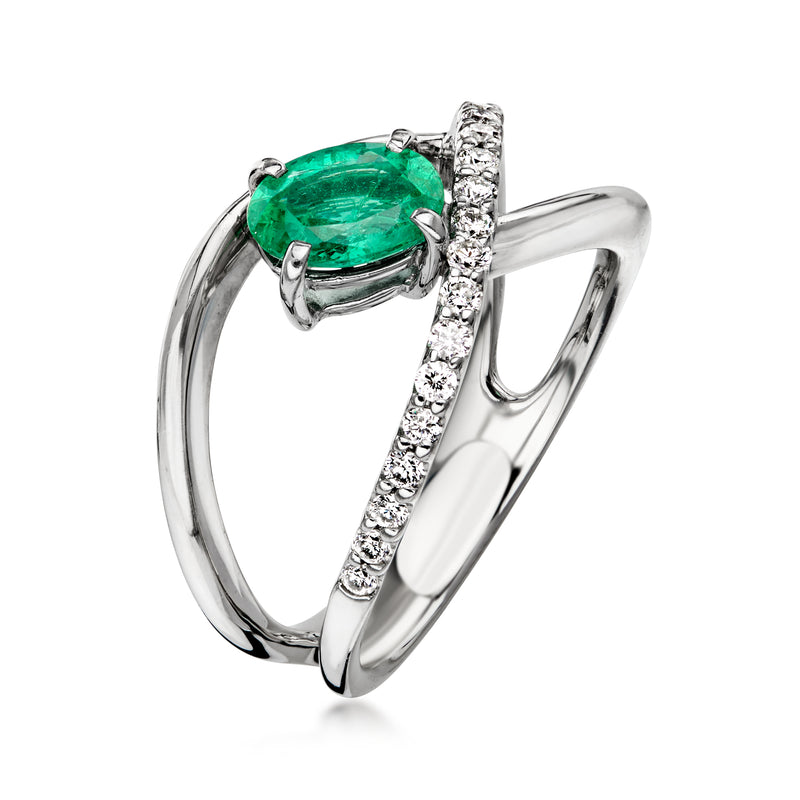 C. 2000 Vintage .64 Carat Emerald Open-Space Ring with .25 ct. t.w. Diamonds in Platinum. Size 6.25