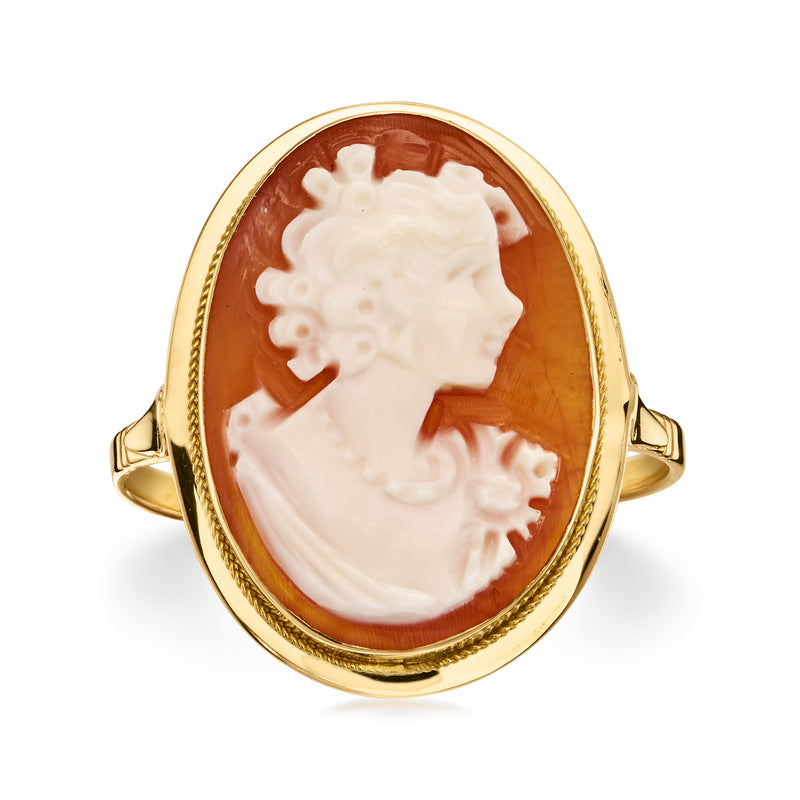 Oval brown shell cameo ring with white profile and 14kt yellow gold bezel