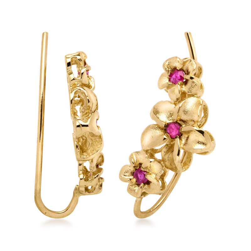 Side view of 14kt yellow gold flower ear climber earrings with pink gemstone clusters