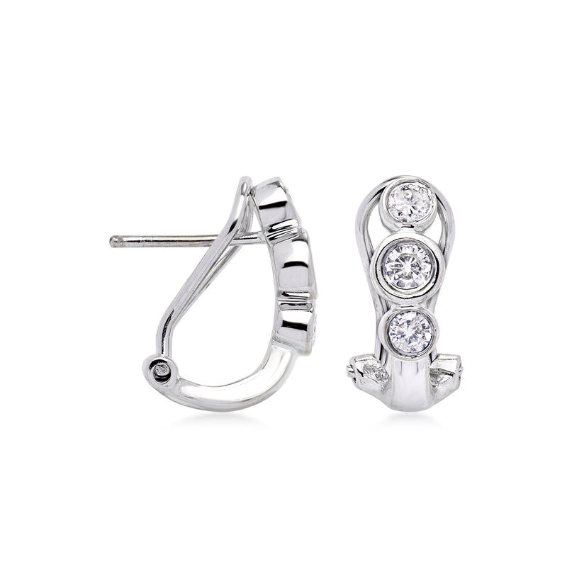Curved 14kt white gold hoop earrings with three round diamond accents