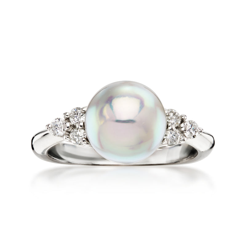 C. 1990 Vintage 8.5mm Cultured Pearl Ring with .20 ct. t.w. Diamonds in Platinum. Size 5