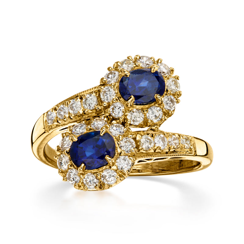 C. 1990 Vintage 1.00 ct. t.w. Sapphire and .70 ct. t.w. Diamond Bypass Ring in 18kt Yellow Gold. Size 6