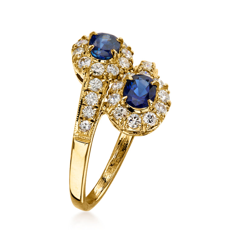 C. 1990 Vintage 1.00 ct. t.w. Sapphire and .70 ct. t.w. Diamond Bypass Ring in 18kt Yellow Gold. Size 6