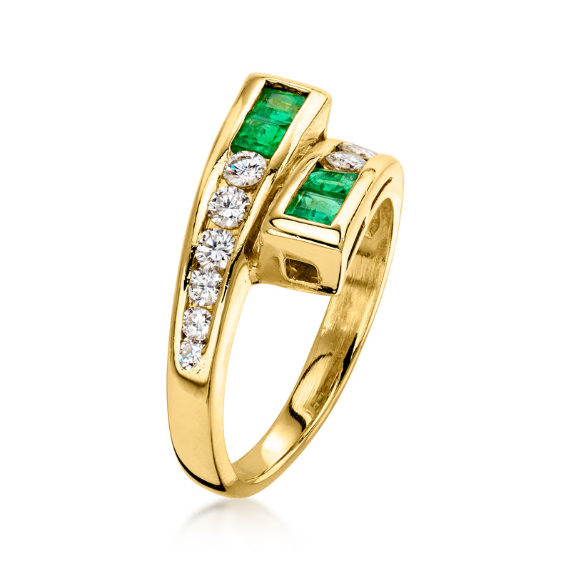 C. 1980 Vintage .55 ct. t.w. Diamond and .40 ct. t.w. Emerald Bypass Ring in 18kt Yellow Gold. Size 6.75