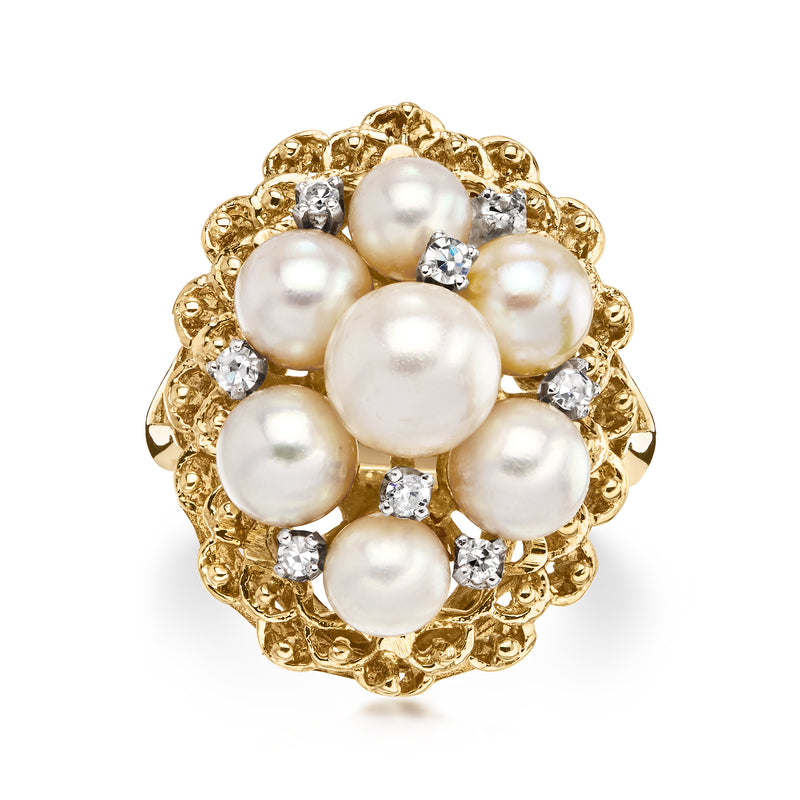 Cultured pearl cluster ring in 14kt yellow gold with diamond accents and round pearls.