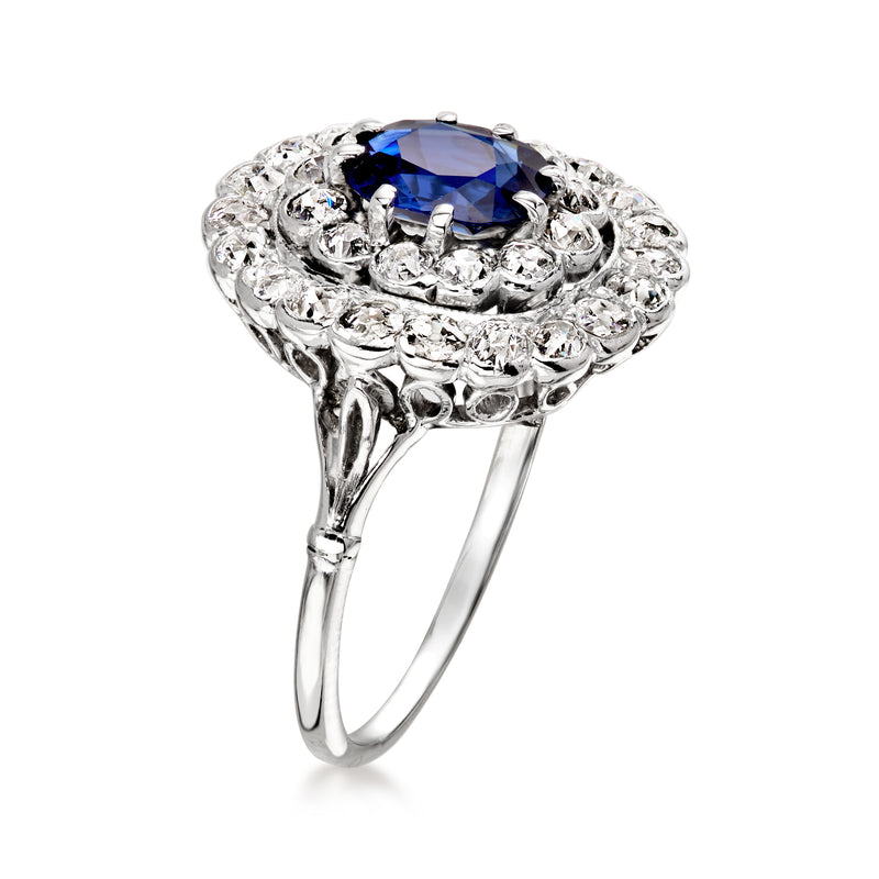 C. 1980 Vintage .90 Carat Sapphire Ring with 1.00 ct. t.w. Diamonds in Platinum. Size 6