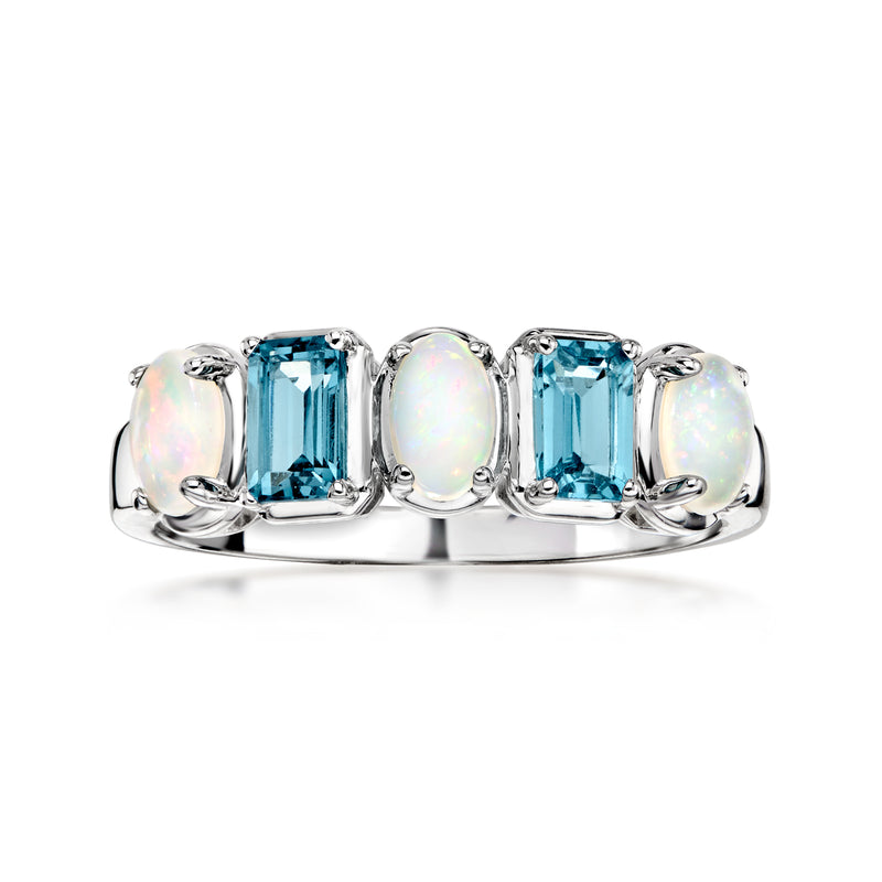 Sterling silver ring with rectangular blue topaz and opal cabochons, three-stone
