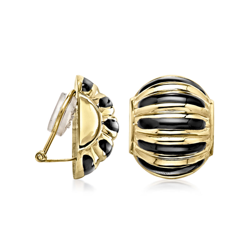 Vintage clip-on earrings, side view: black enamel ridged discs in yellow gold tone