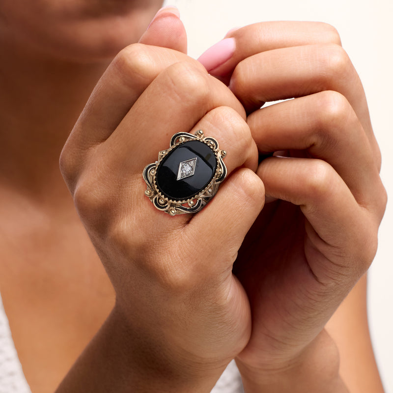 C. 1950 Vintage Onyx Ring with Single .10 Carat Diamond in 10kt Yellow Gold. Size 7