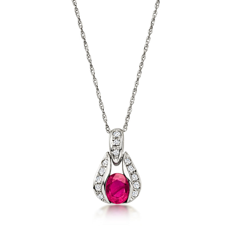 C. 2000 Vintage .69 Carat Ruby Pendant Necklace with .10 ct. t.w. Diamonds in Platinum. 18"