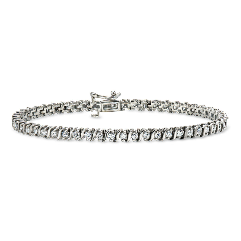 C. 1990 Vintage 2.00 ct. t.w. Diamond Tennis Bracelet in 14kt White Gold. 7"