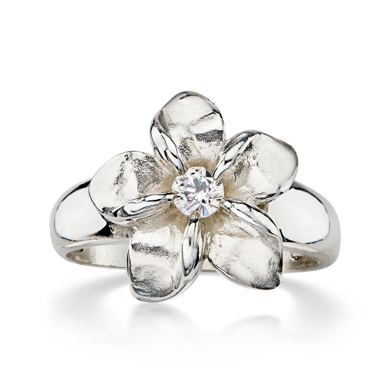 C. 1990 Vintage .15 Carat CZ Flower Ring in Sterling Silver. Size 7.25