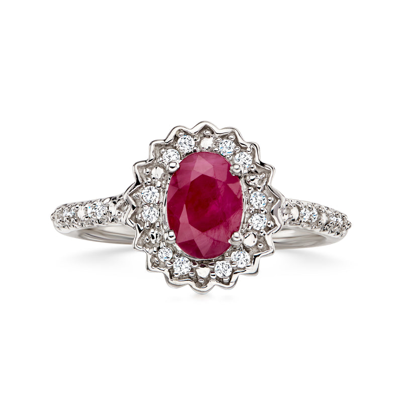 C. 2000 Vintage 1.10 Carat Ruby Ring with .20 ct. t.w. Diamonds in 10kt White Gold. Size 6
