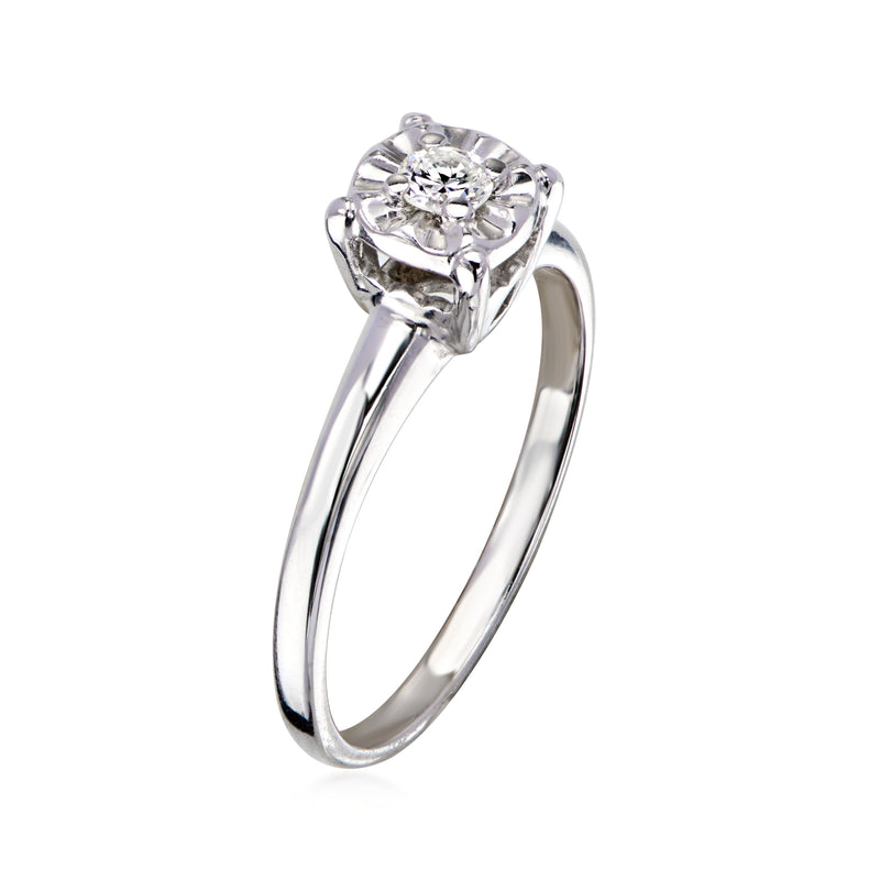 C. 1980 Vintage .12 Carat Diamond Solitaire Ring in 14kt White Gold. Size 7