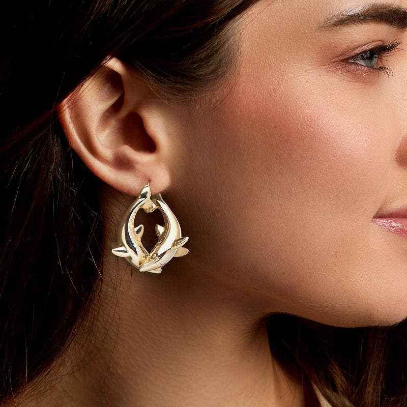C. 1980 Vintage 14kt Yellow Gold Double Dolphin Hoop Earrings. 1 1/4"
