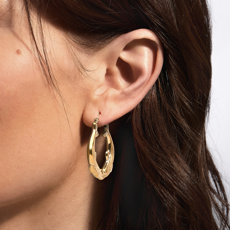 C. 1980 Vintage 14kt Yellow Gold Double Dolphin Hoop Earrings. 1 1/2"