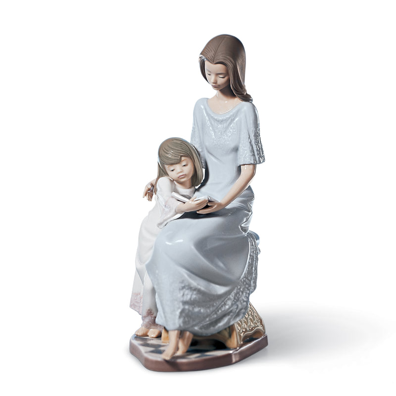 Lladro porcelain figurine of woman reading to a seated child, light blue dresses